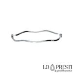 Bracciale rigido in oro bianco 18kt lavorazione lucida,con apertura laterale. Per compleanno,anniversario