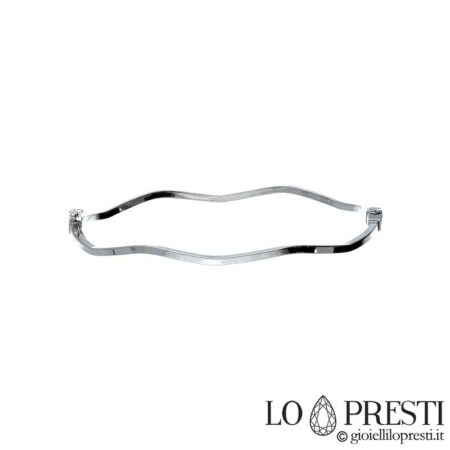 Bracciale rigido in oro bianco 18kt lavorazione lucida,con apertura laterale. Per compleanno,anniversario