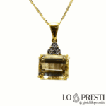 Collana e ciondolo artigianale con topazio e diamanti taglio brillante in oro bianco e giallo 18kt. Certificato di garanzia e confezione regalo.