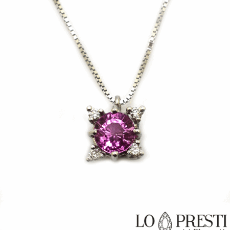 Raffinata collana pendente punto luce con zaffiro rosa taglio rotondo e diamanti taglio brillante in oro bianco 18kt. Certificato di garanzia e confezione regalo.