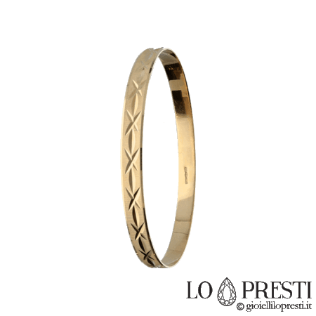 Bracciale donna rigido lavorazione a fantasia in oro giallo 18kt . Per compleanno,anniversario o semplicemente per ricordare un momento importante. Certificato di garanzia e confezione regalo.